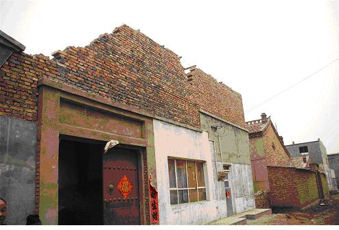 时评:拆除违章建筑 从强制到自愿